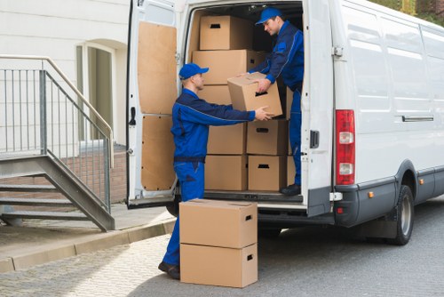 Professional removals team working in a Belgravia townhouse