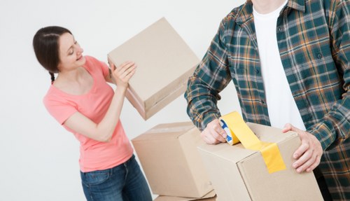 Charitable donation boxes and reusable household items prepared for reuse