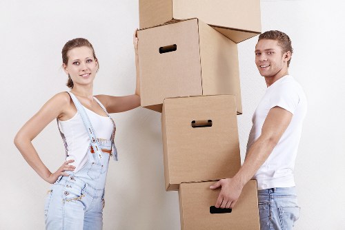 Expert packers preparing fragile household items in Belgravia