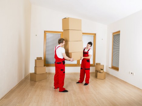 Business relocation logistics in Belgravia showing careful office equipment handling